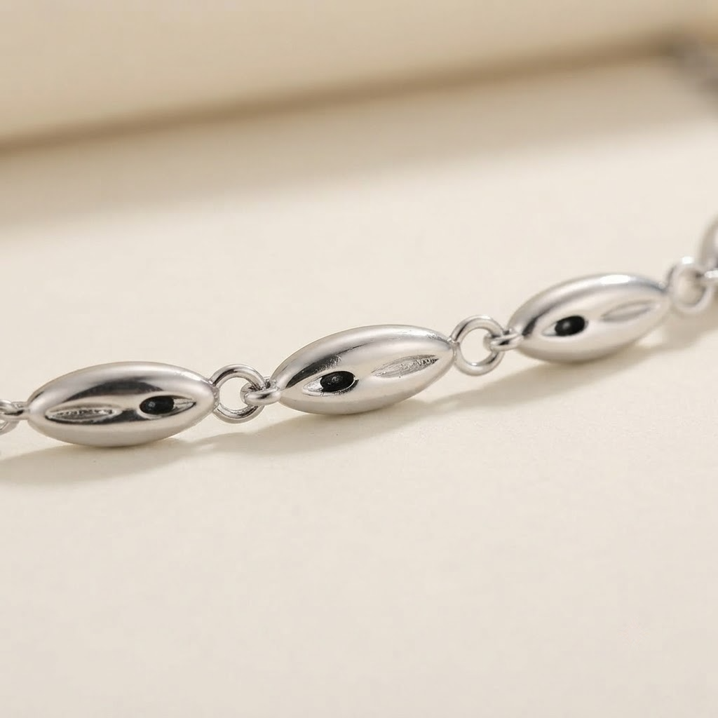 Close-up of polished oval beads on SILVROSE Mira anklet